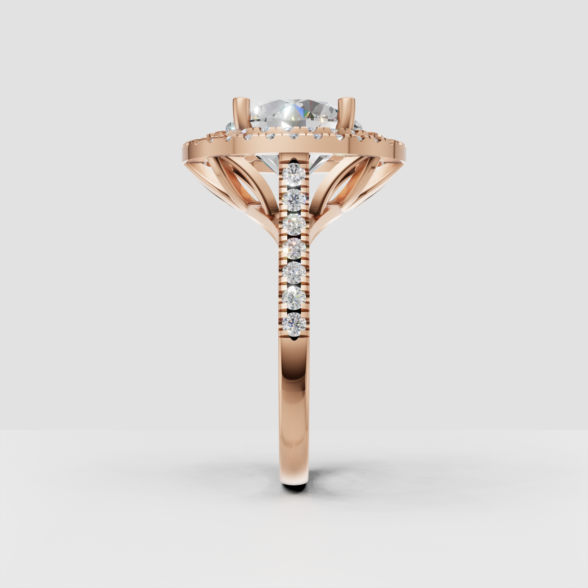 Pavé round diamond engagement ring with open cathedral-style gallery