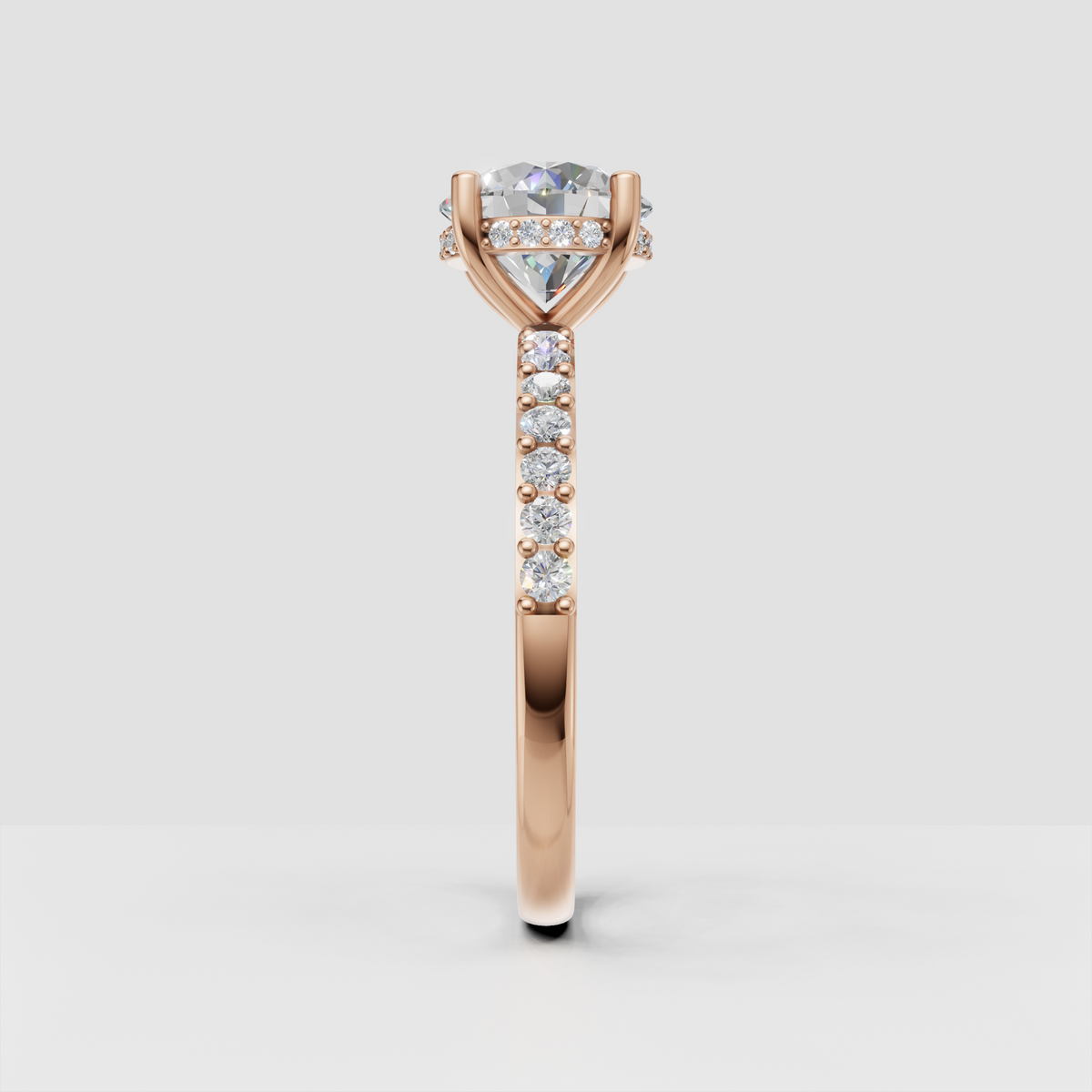 Round diamond bridal ring with pavé shoulders and polished gold band