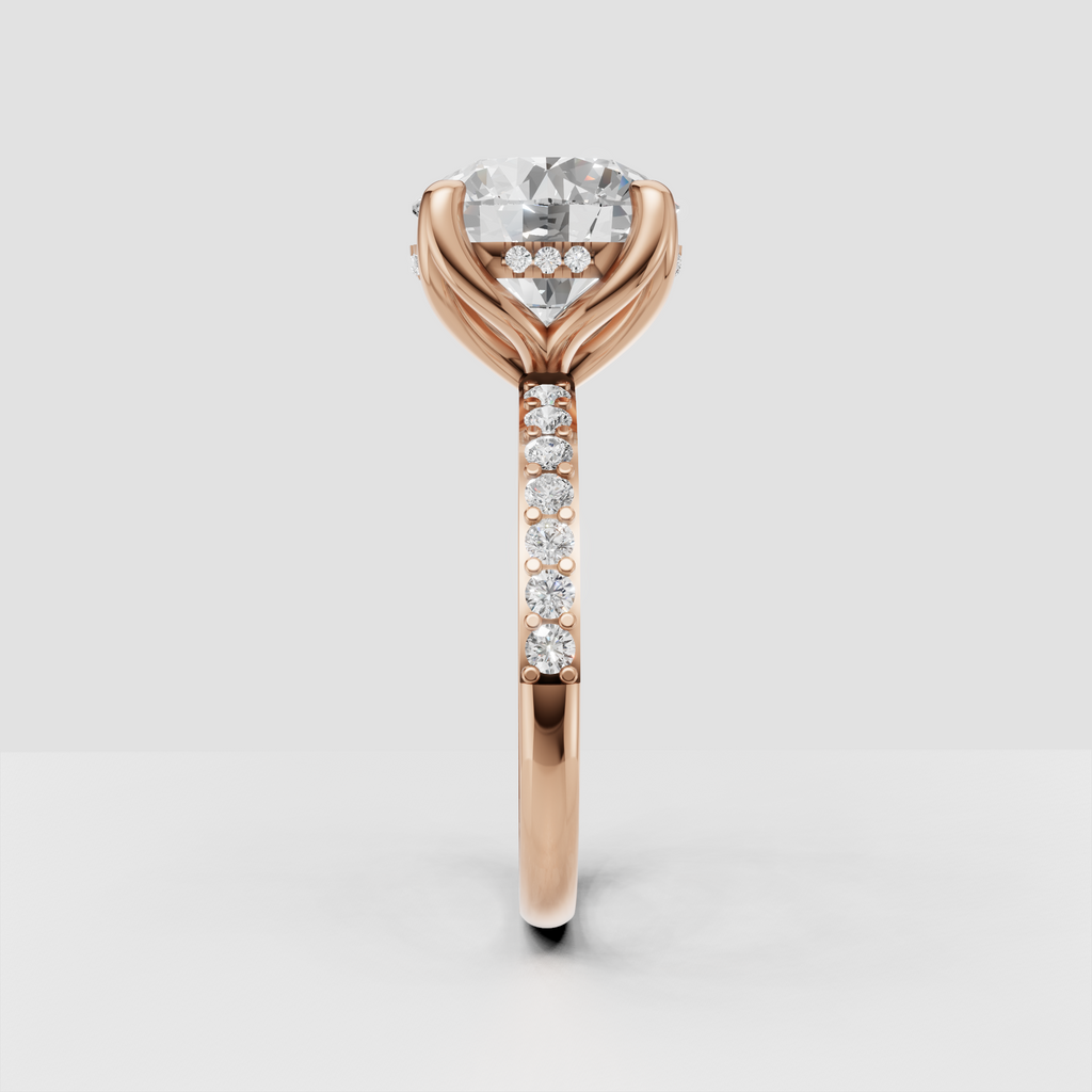 Side profile of yellow gold round Diamond cathedral engagement ring