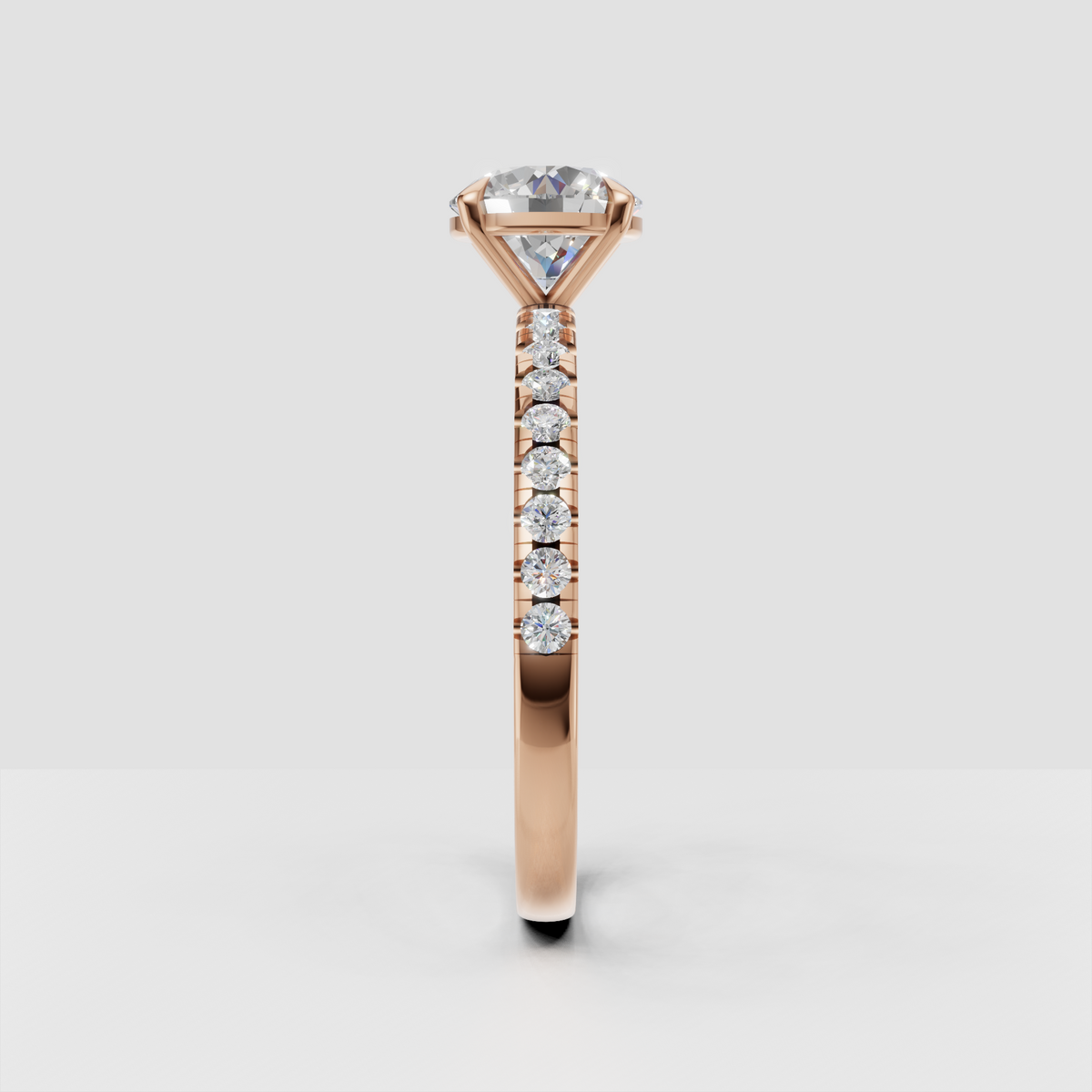 Round diamond wedding band with closely spaced side diamonds