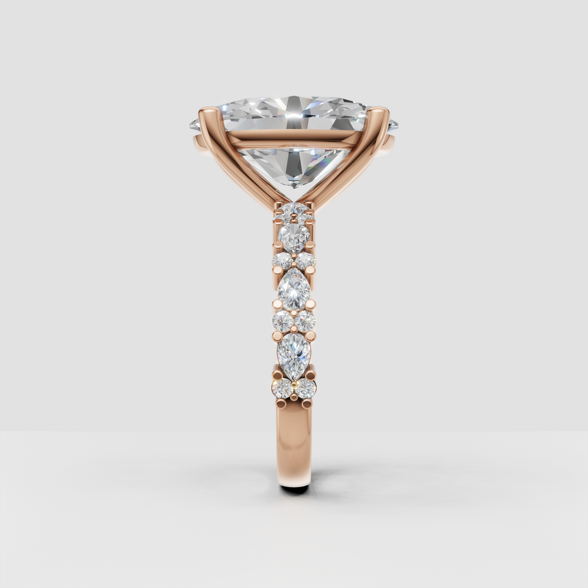 Oval center stone engagement ring in polished yellow gold