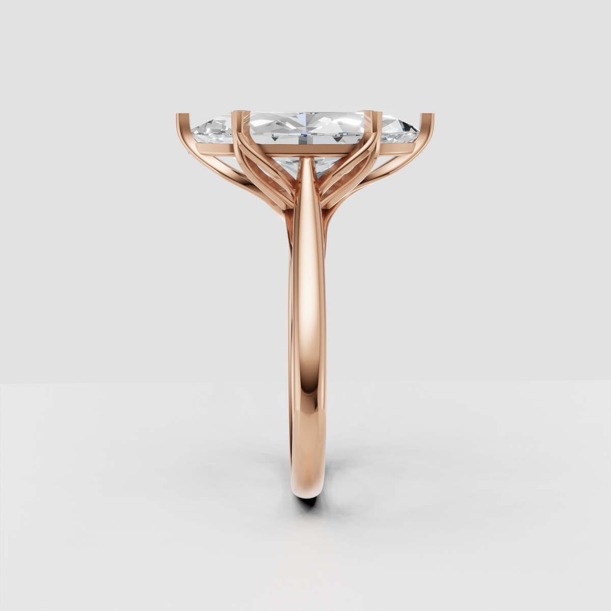 Sculptural marquise engagement ring with split shoulder design