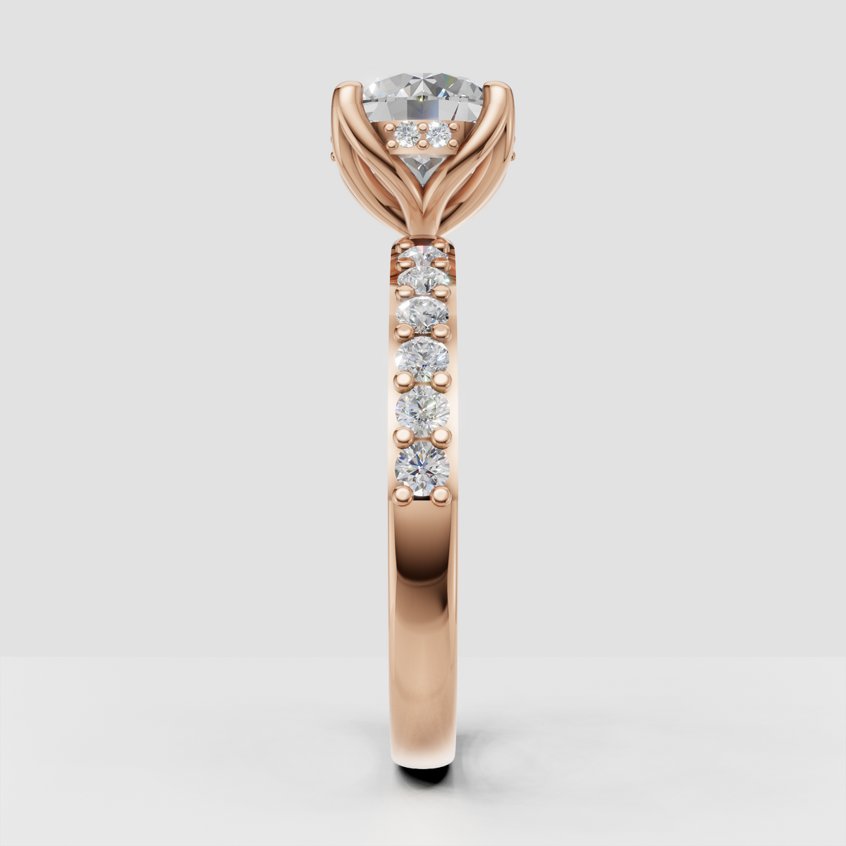 Elegant round diamond engagement ring with pavé shoulders