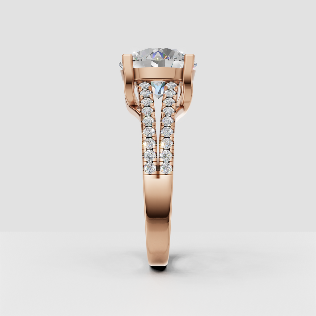 Round diamond anniversary ring with pavé accent stones along split shank