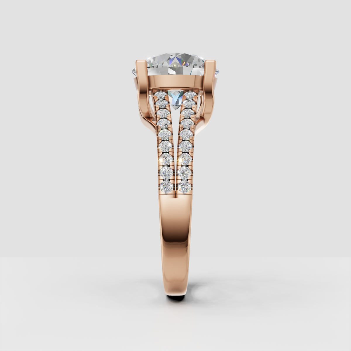 Round diamond anniversary ring with pavé accent stones along split shank