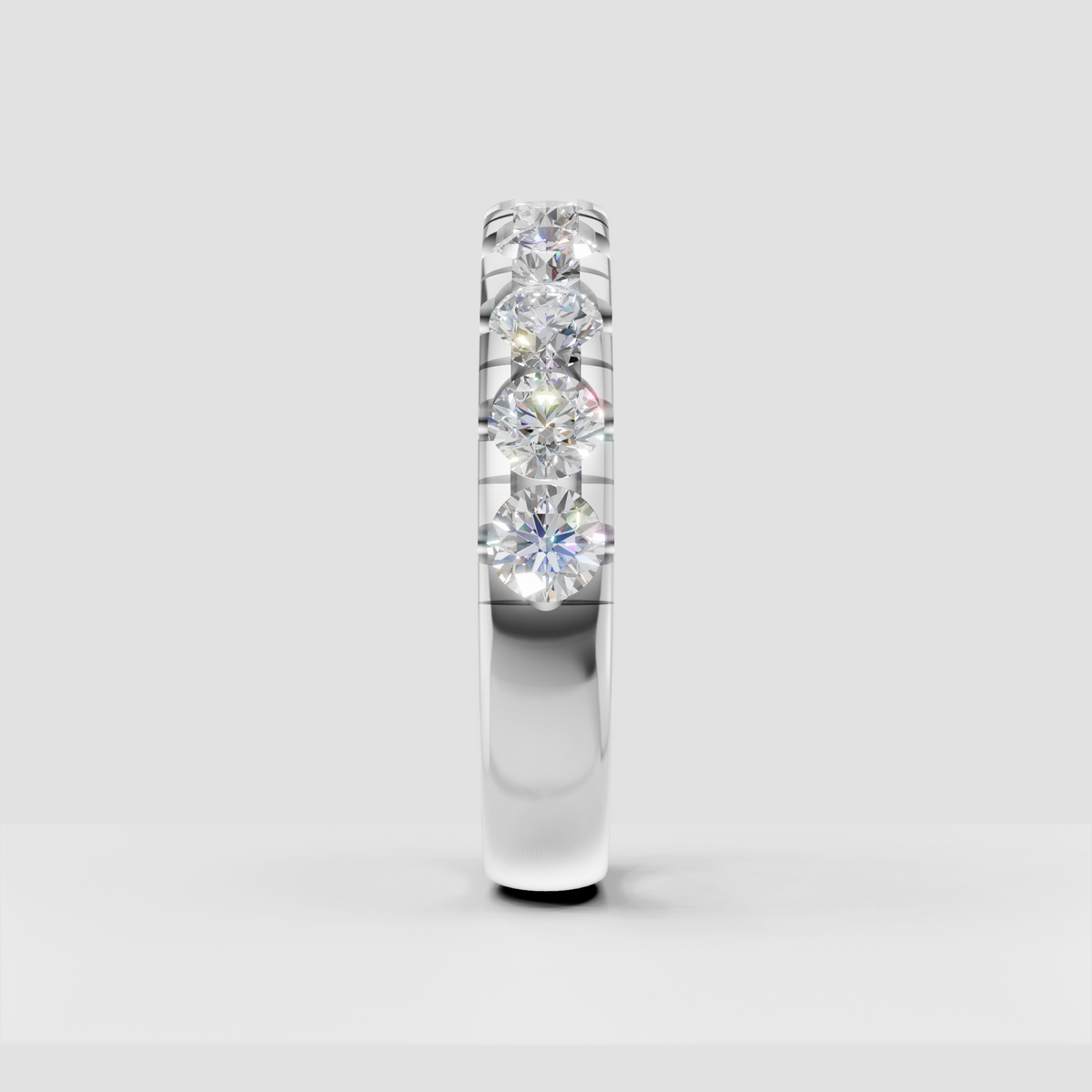 Contemporary round diamond eternity ring with polished metal finish
