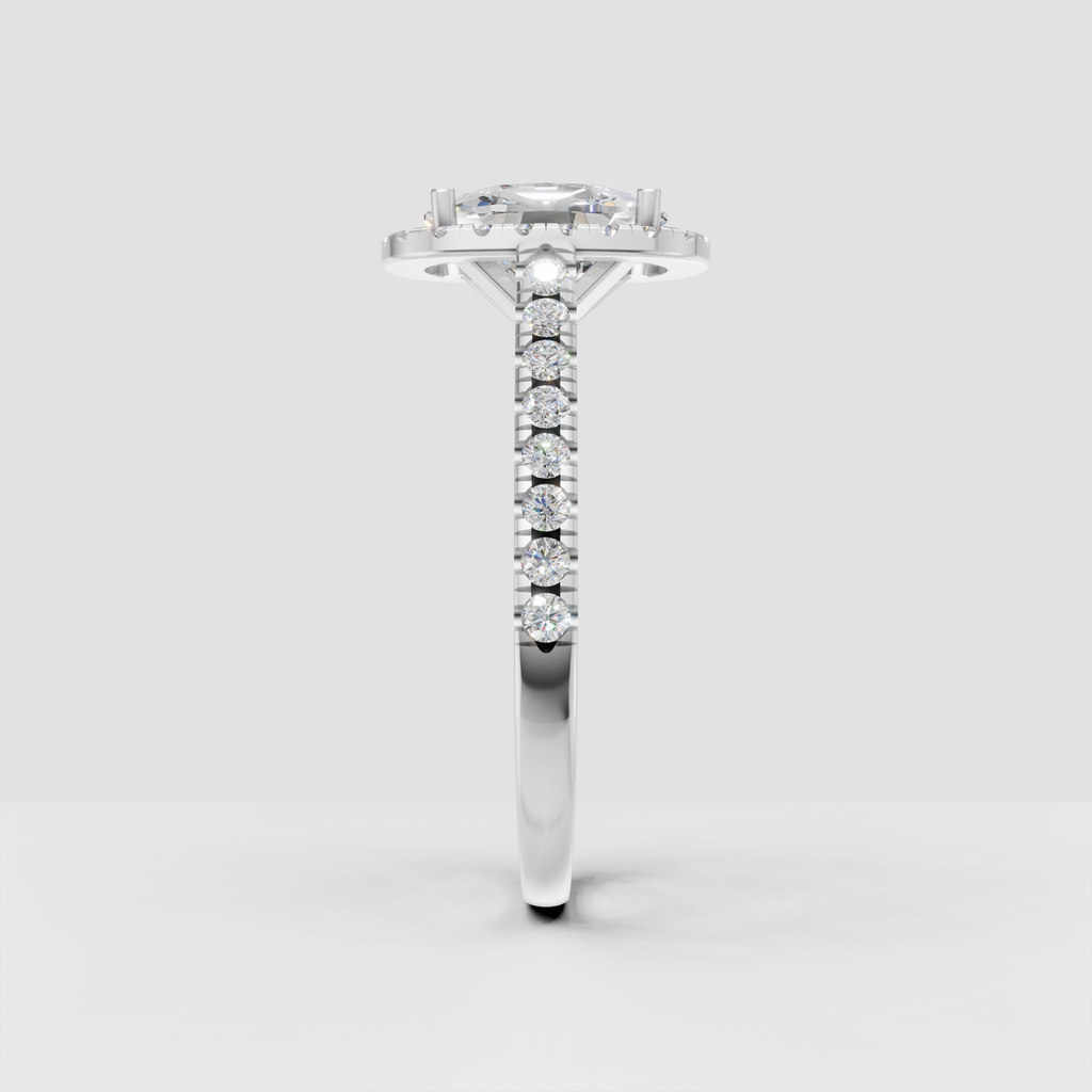 Elongated cushion diamond ring with full halo and diamond pavé shank