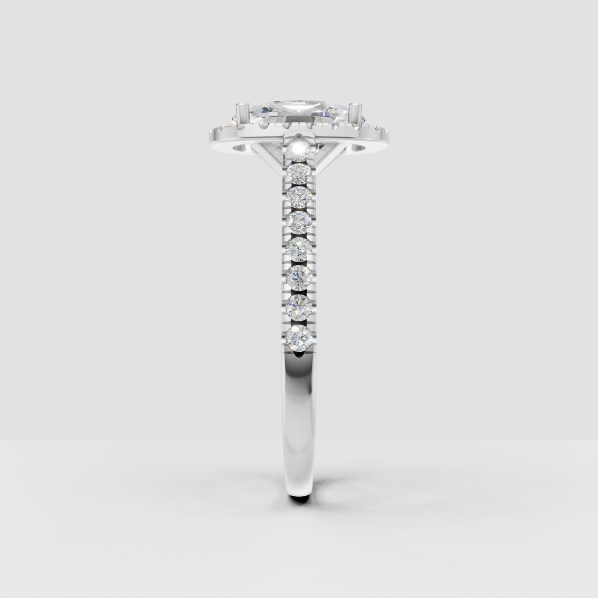Elongated cushion diamond ring with full halo and diamond pavé shank