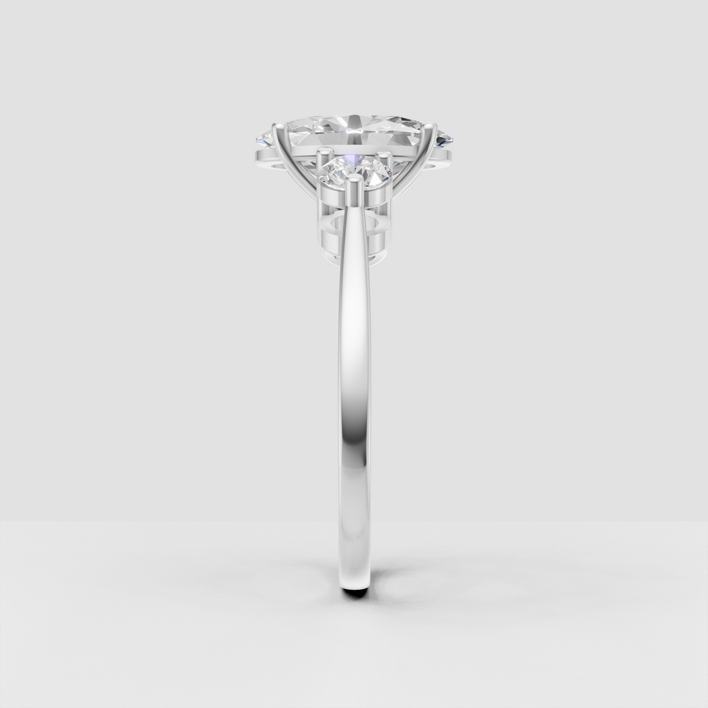 Polished gold oval diamond three stone engagement ring