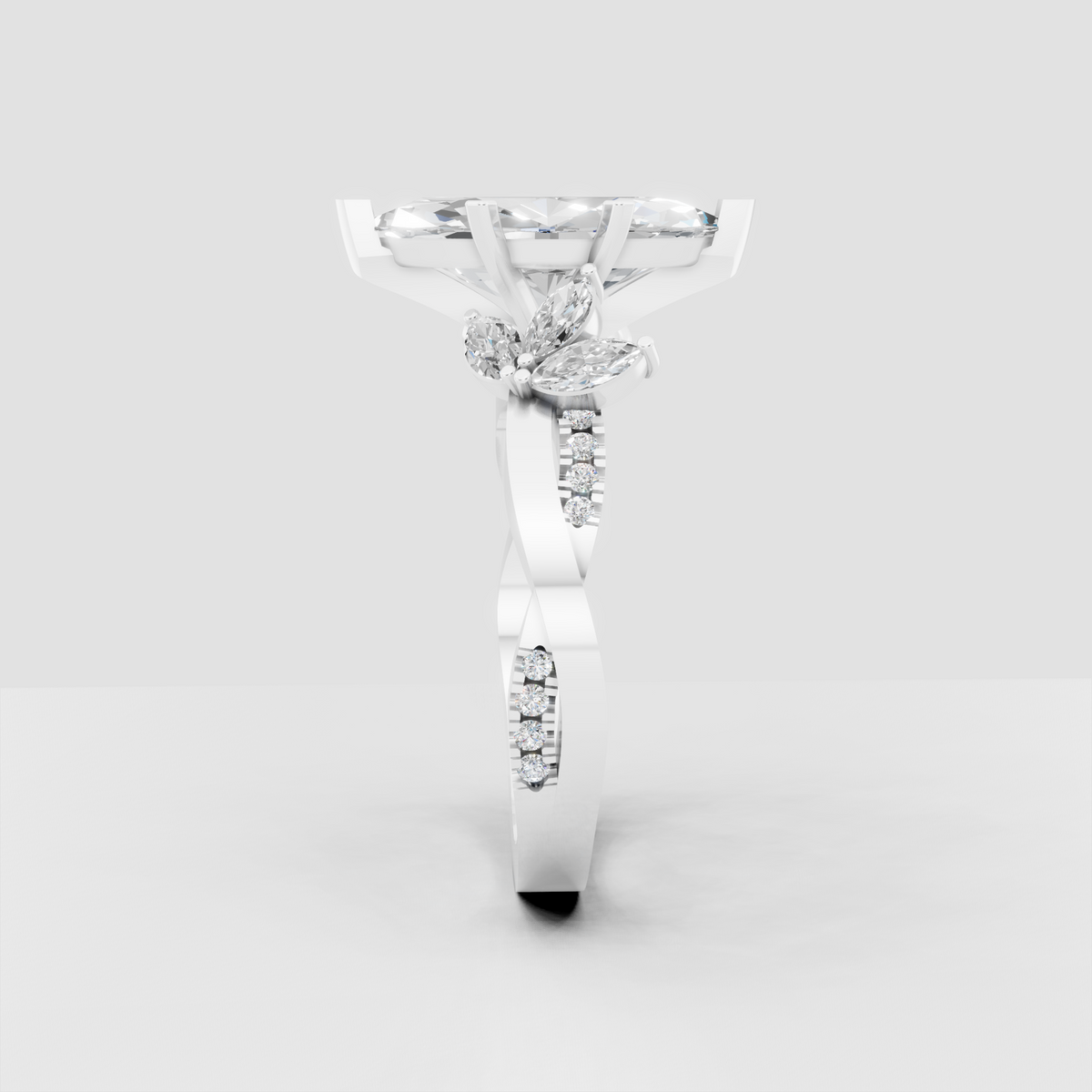 Marquise diamond ring featuring three marquise floral side stones