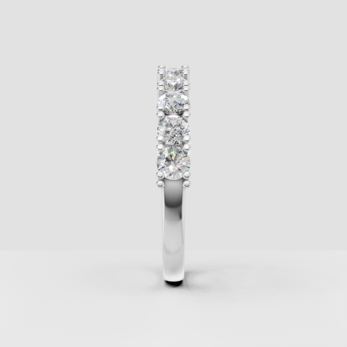 Prong set round diamond half eternity band