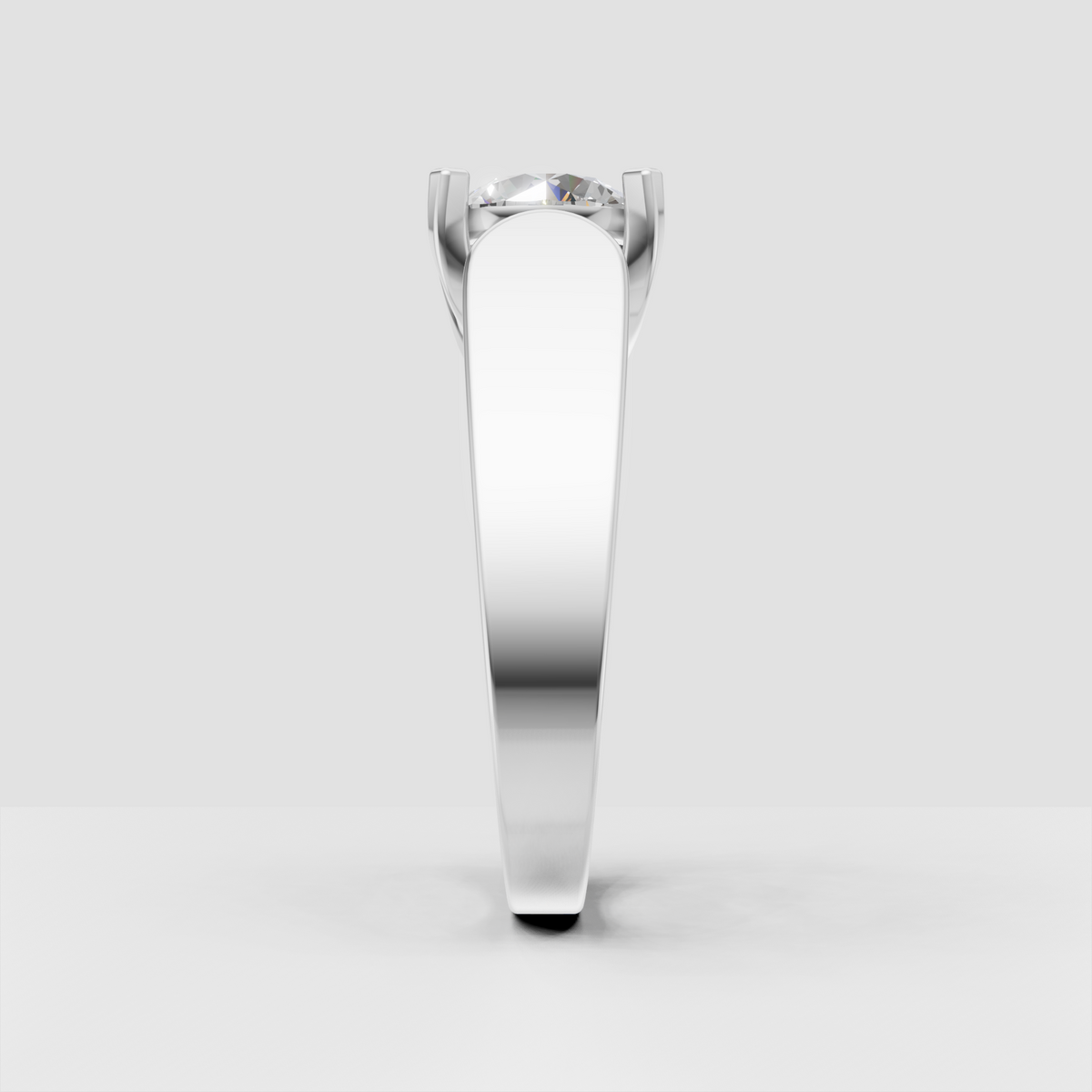 Modern round cut engagement ring with wide band and round side stones