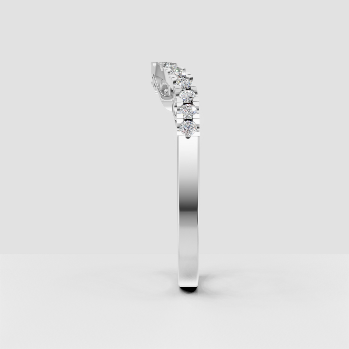 Vintage filigree diamond band featuring a curved row of brilliant round stones