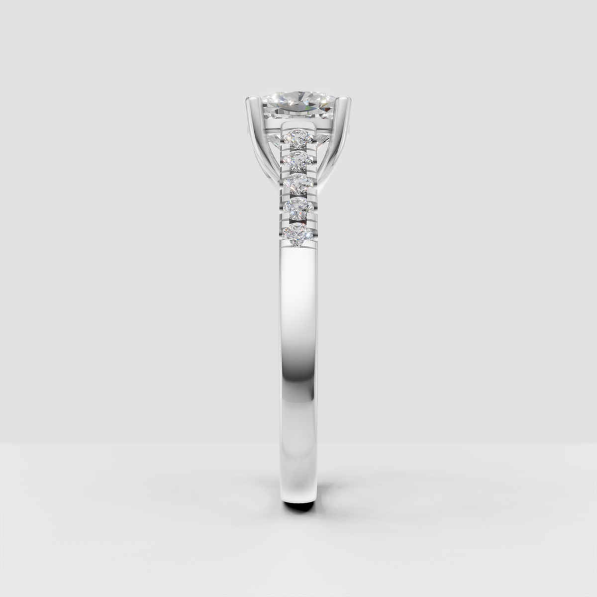 Luxury cushion cut solitaire ring with pavé diamond shoulders