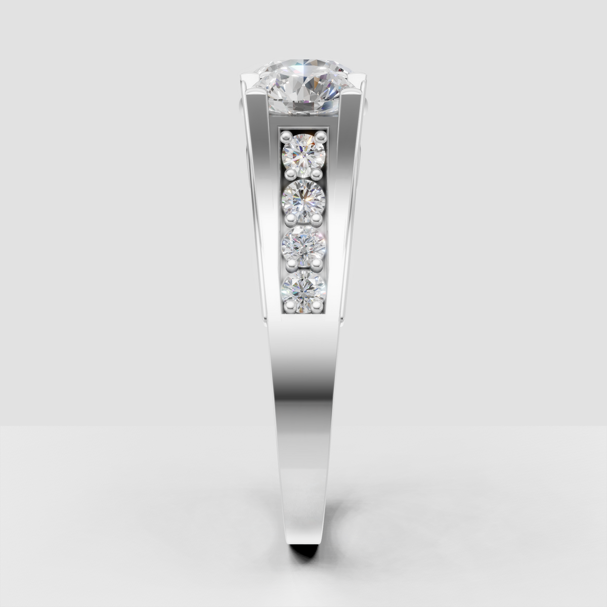 Polished yellow gold three-stone ring with round brilliant Diamond stones