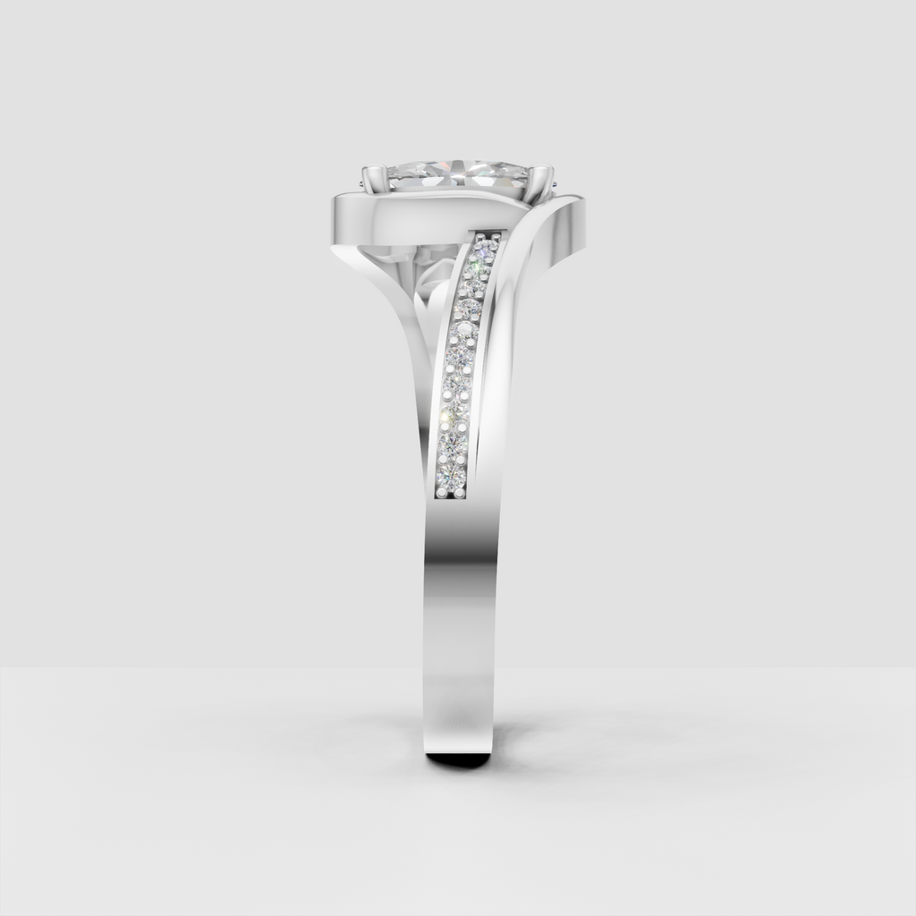 Oval diamond ring with four prongs and delicate pave stones along the band