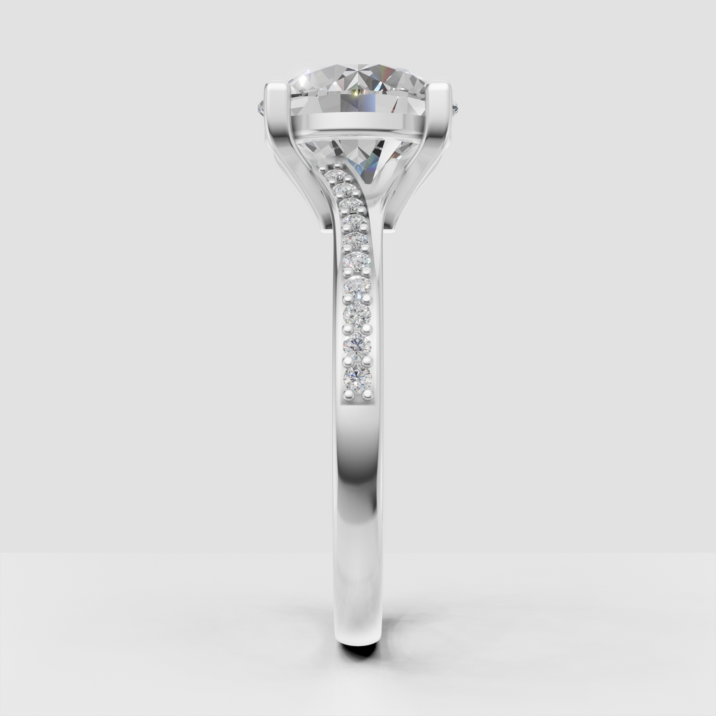 Yellow gold cathedral engagement ring with round center stone
