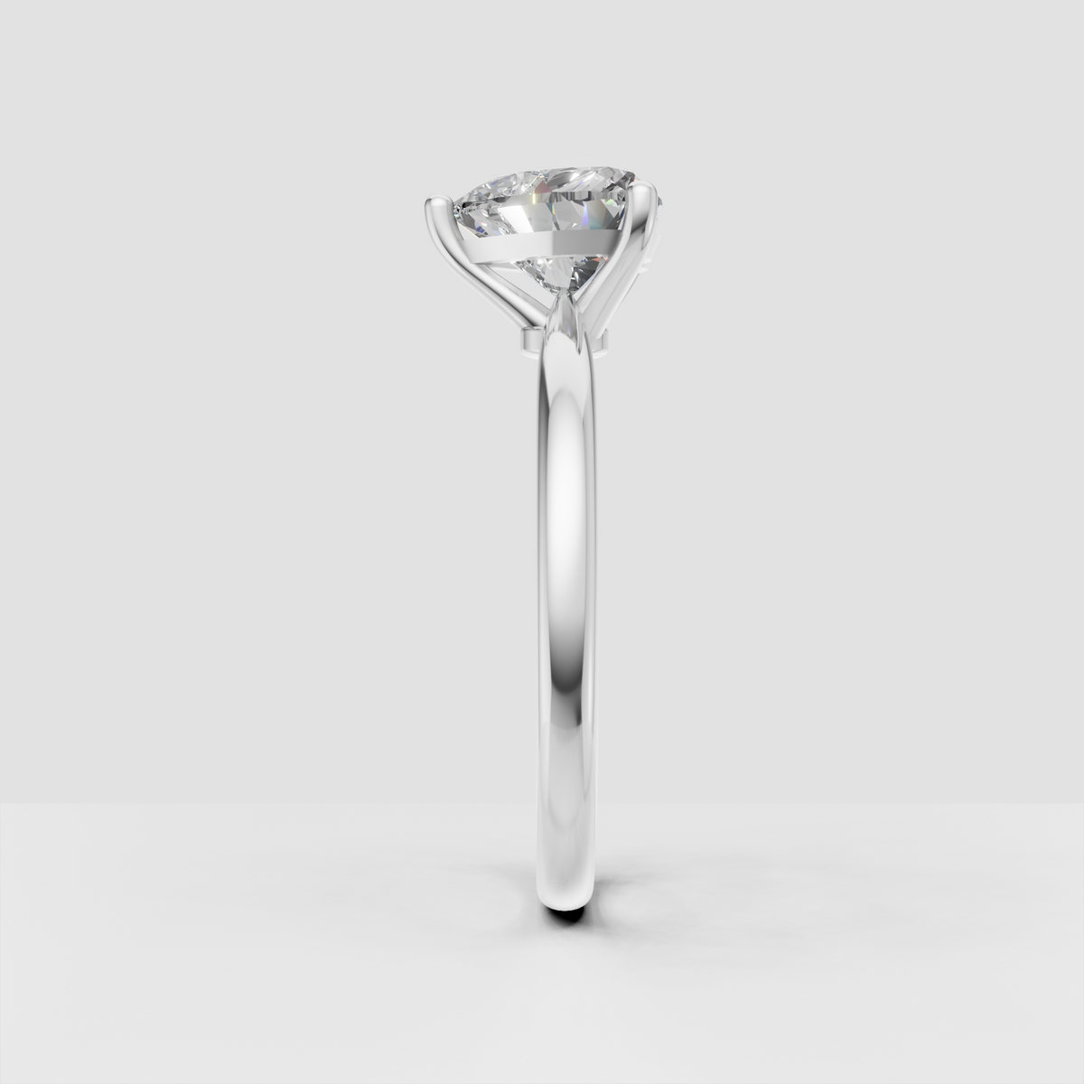 Heart cut diamond anniversary ring with minimalist solitaire design