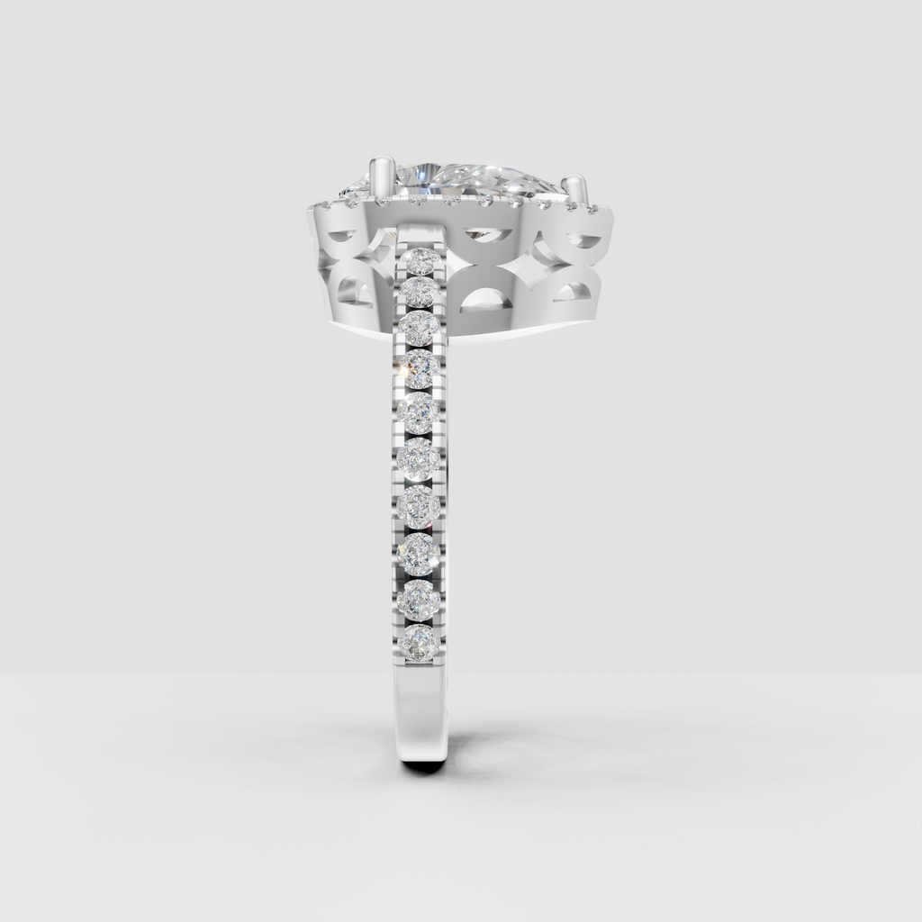Pear center diamond engagement ring with detailed pave band