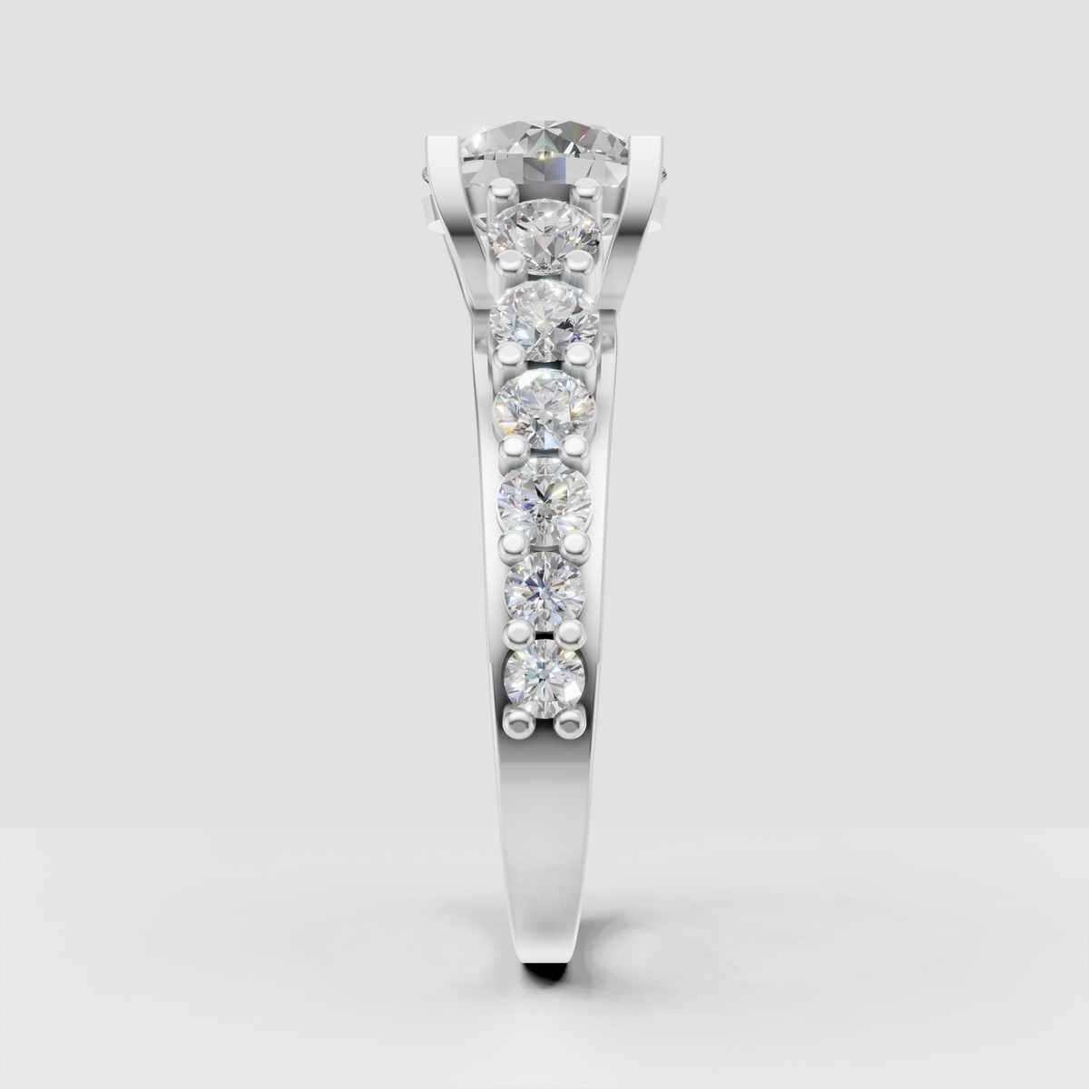Elegant round diamond engagement ring with clustered side stones
