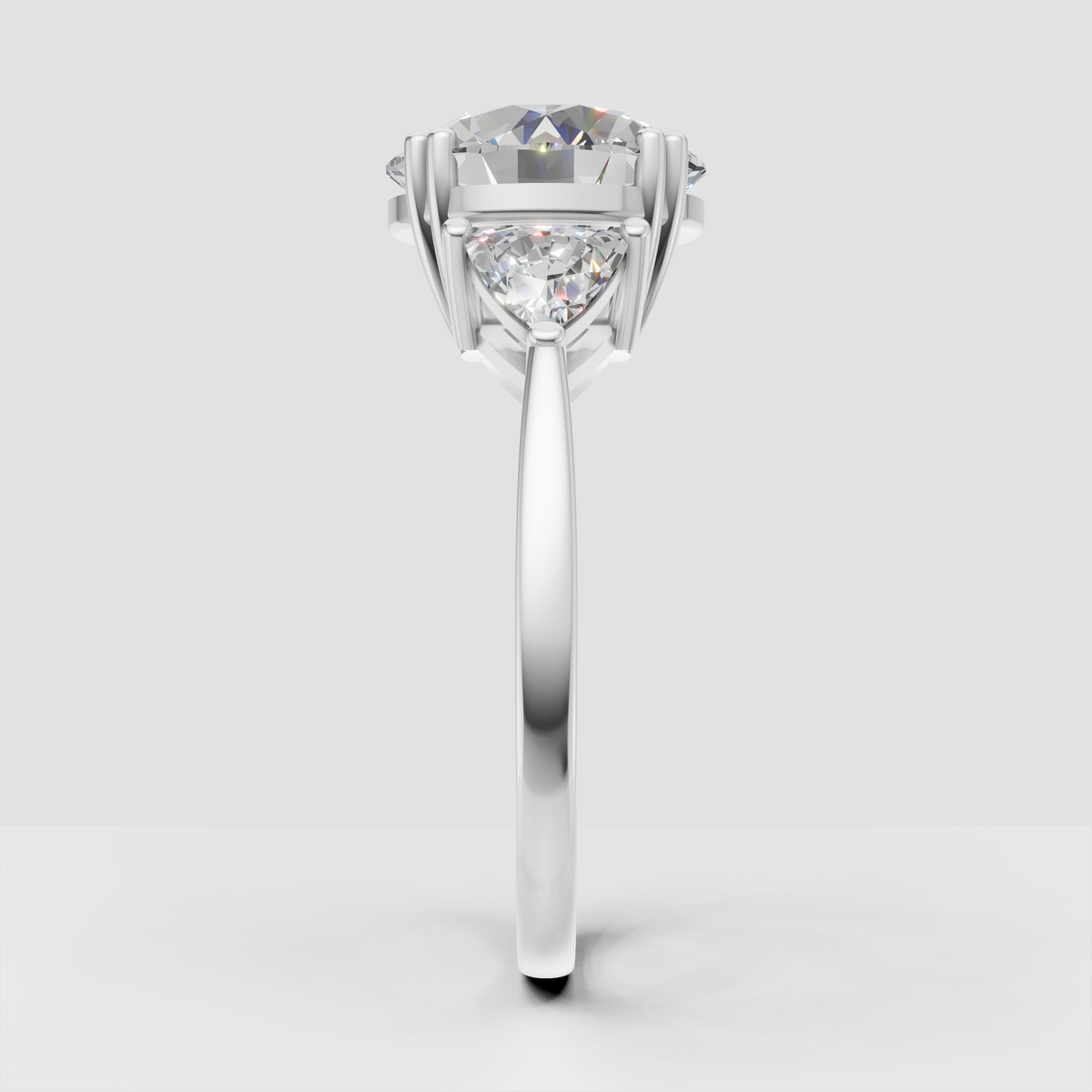 Six-prong round diamond ring with sculptural split shoulders