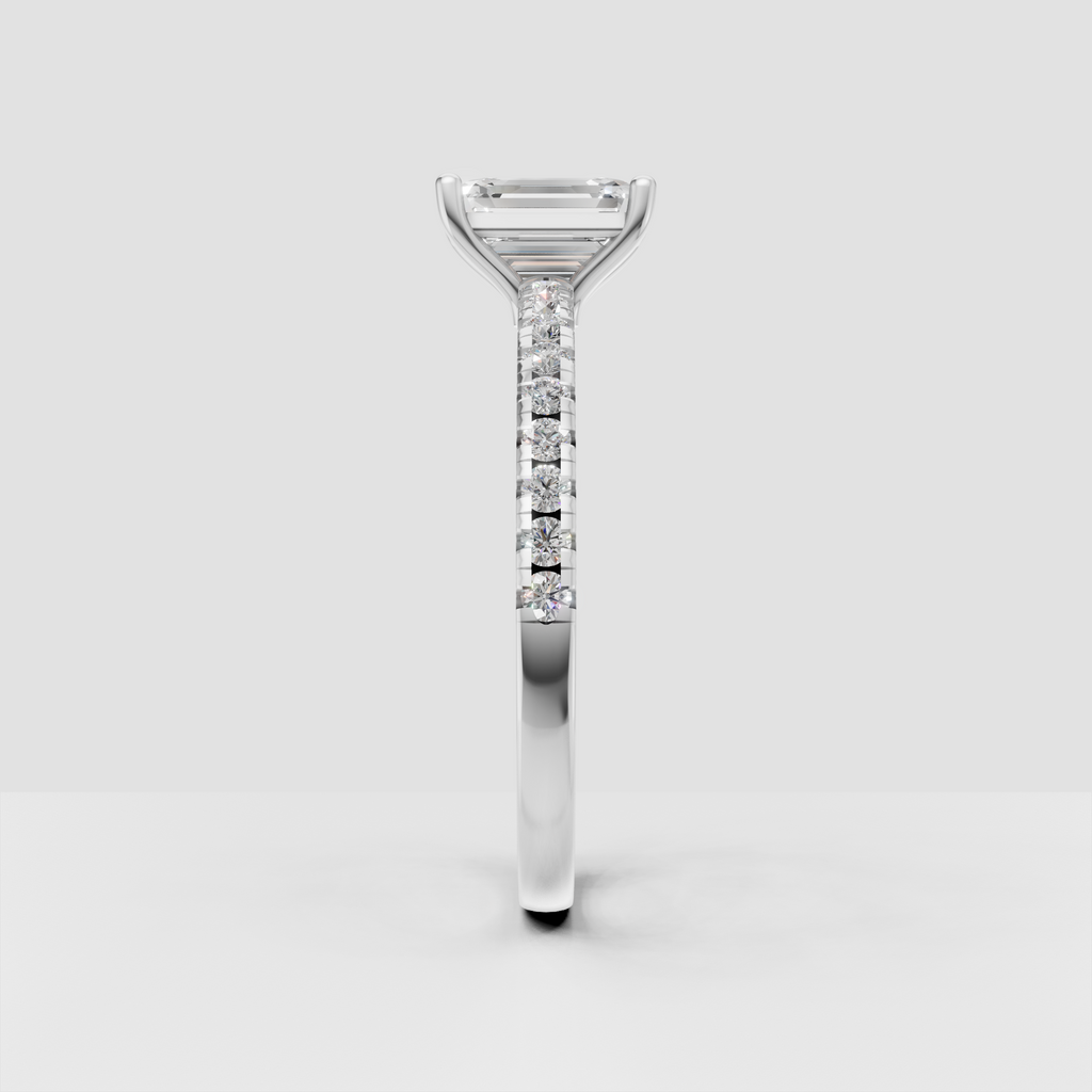 Classic emerald cut diamond ring with four-prong setting