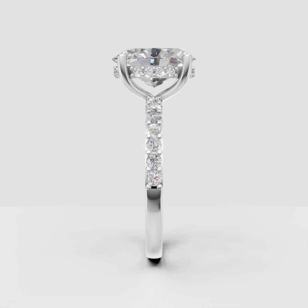 Oval center diamond engagement ring with hidden halo detail