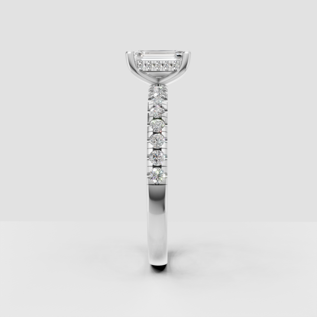 Elegant emerald cut diamond ring with round diamond accented band