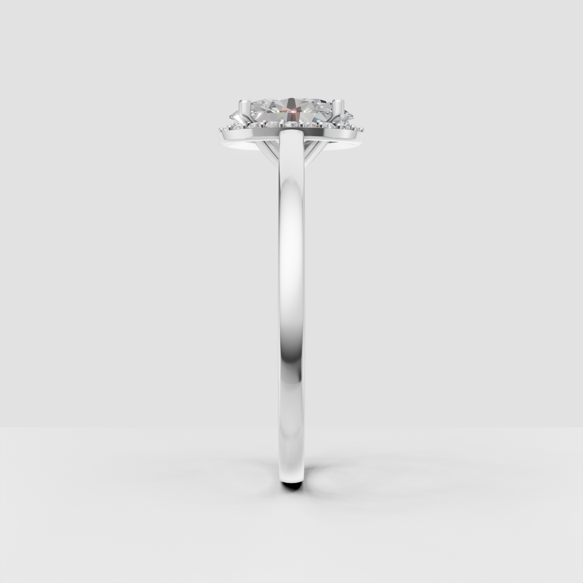 Oval center diamond ring with delicate round halo stones