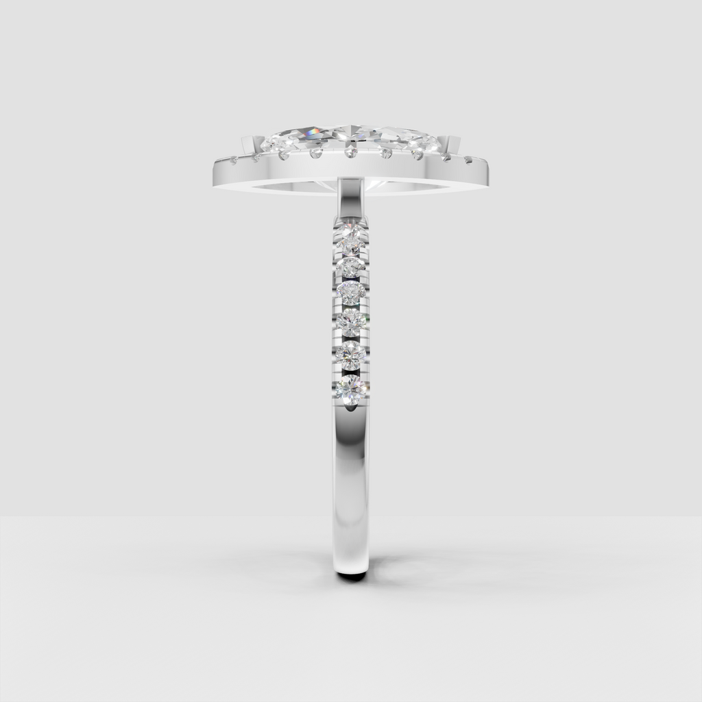 Marquise center diamond framed by a sparkling halo of round accents.