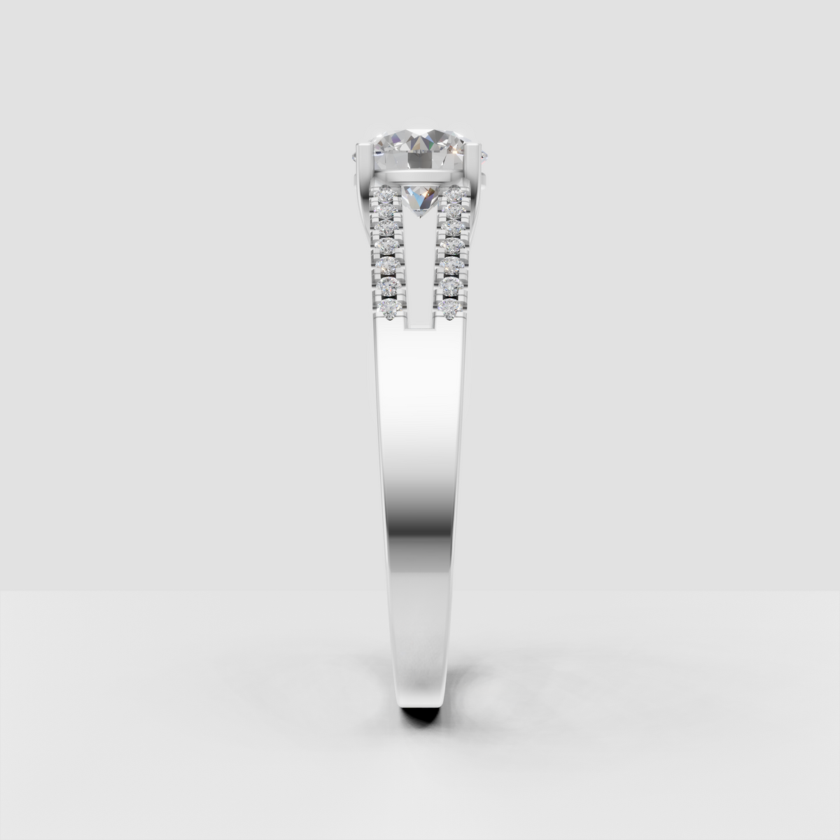 Polished yellow gold engagement ring featuring a round brilliant center stone