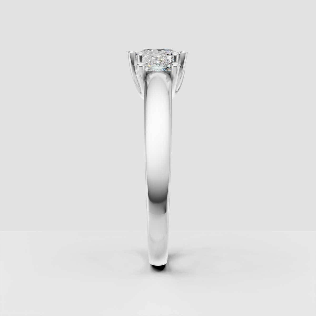 Princess cut center diamond with two side diamonds