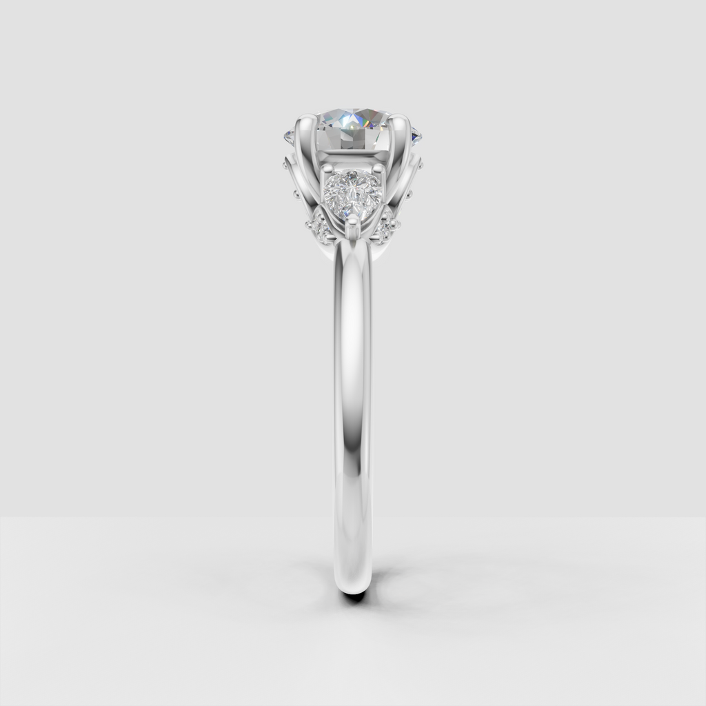 Round center diamond ring with decorative botanical side setting