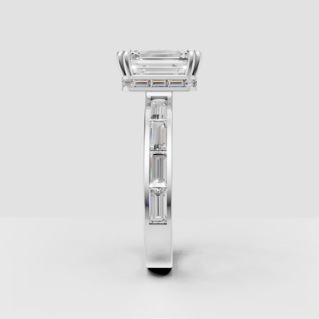 Emerald cut diamond engagement ring with channel-style baguette side stones