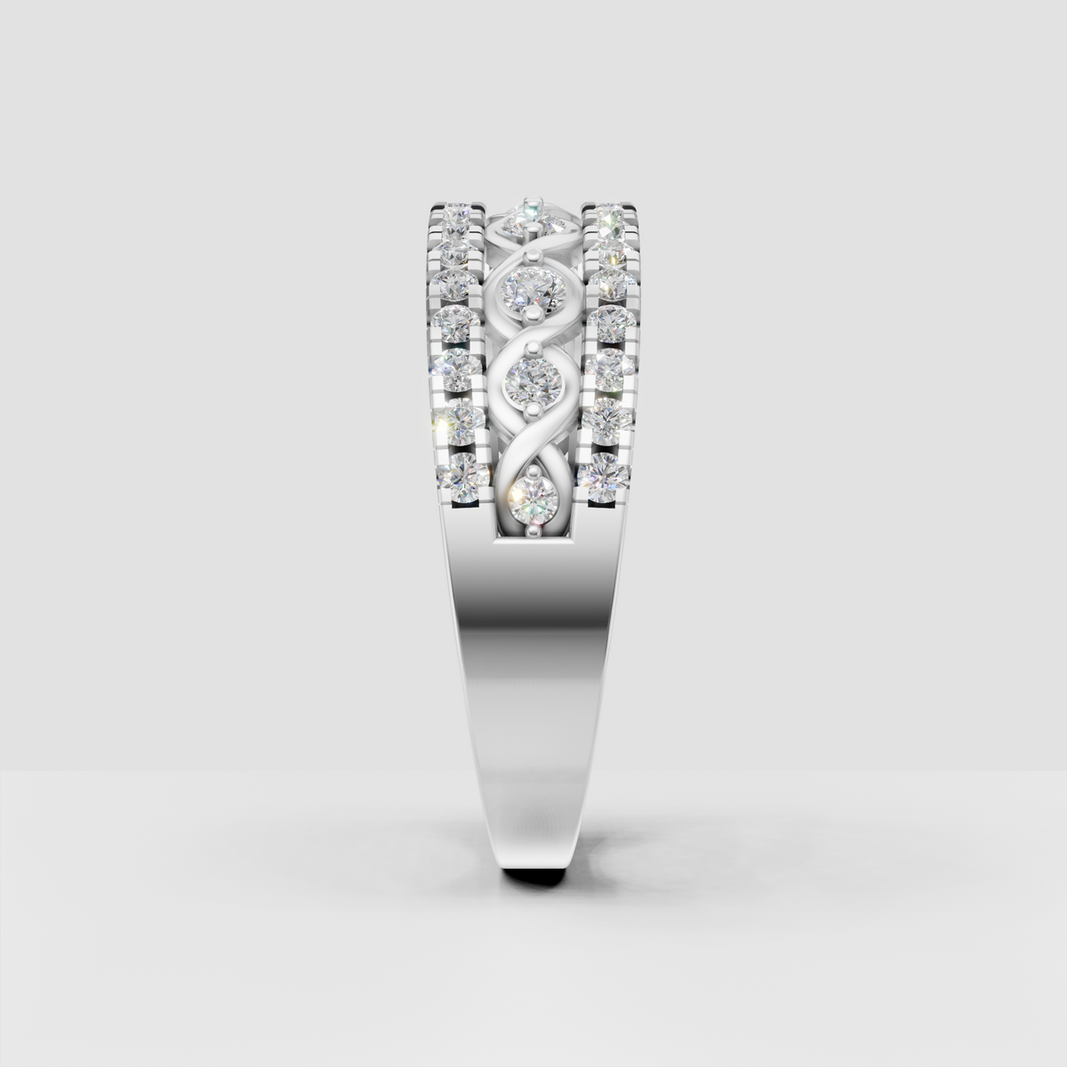 Round diamond ring with symmetrical infinity-inspired center detailing