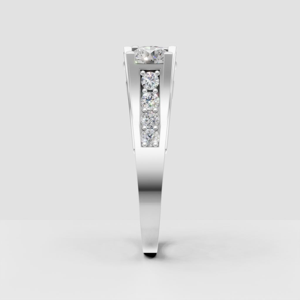 Round diamond three-stone ring with elevated cathedral shoulders
