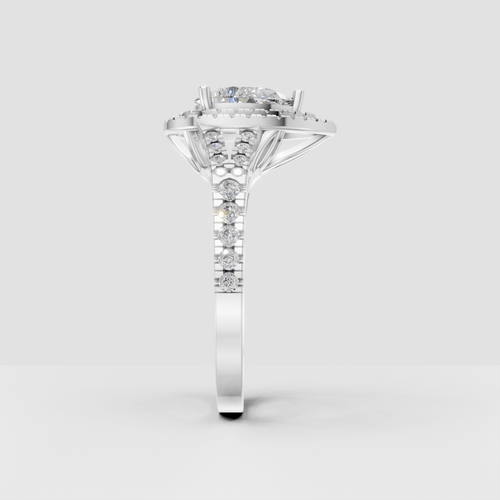 Pear Diamond double halo ring with brilliant pavé diamonds along the band