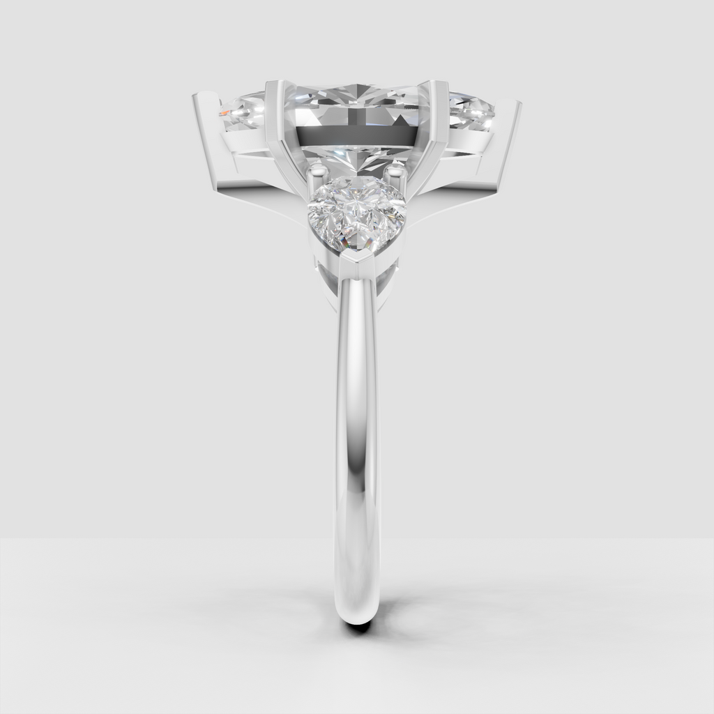 Luxury marquise diamond engagement ring with pear side stones