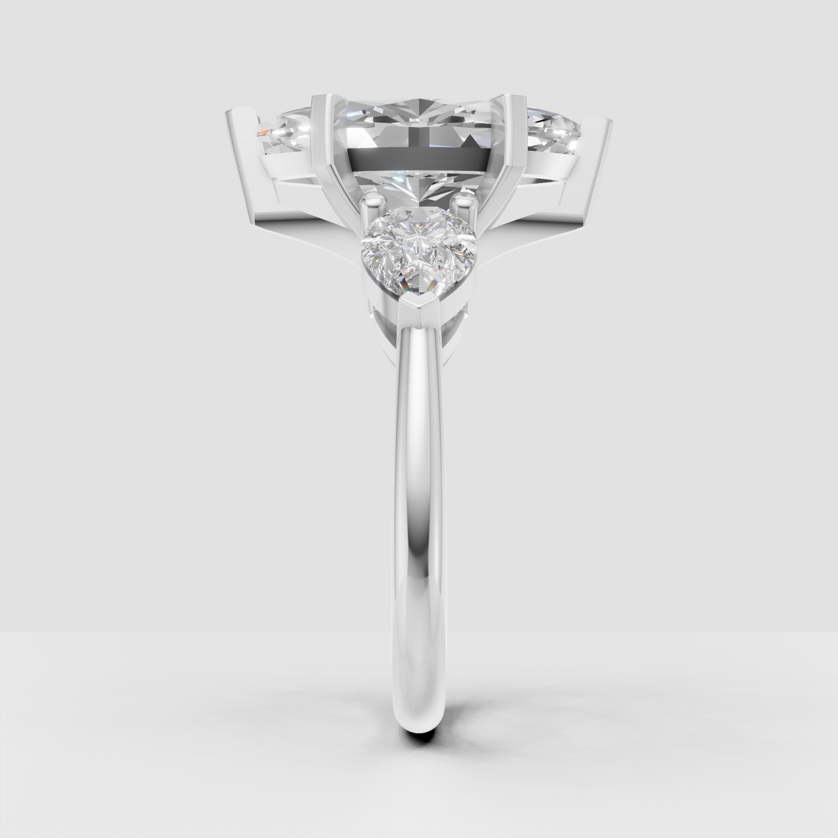 Luxury marquise diamond engagement ring with pear side stones