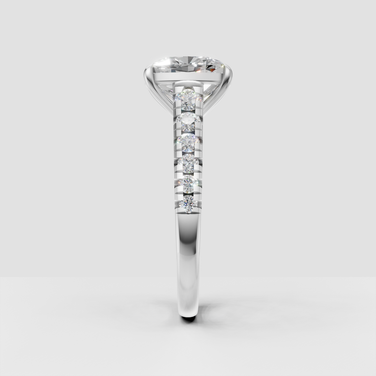 Cushion cut engagement ring with vintage scroll gallery details
