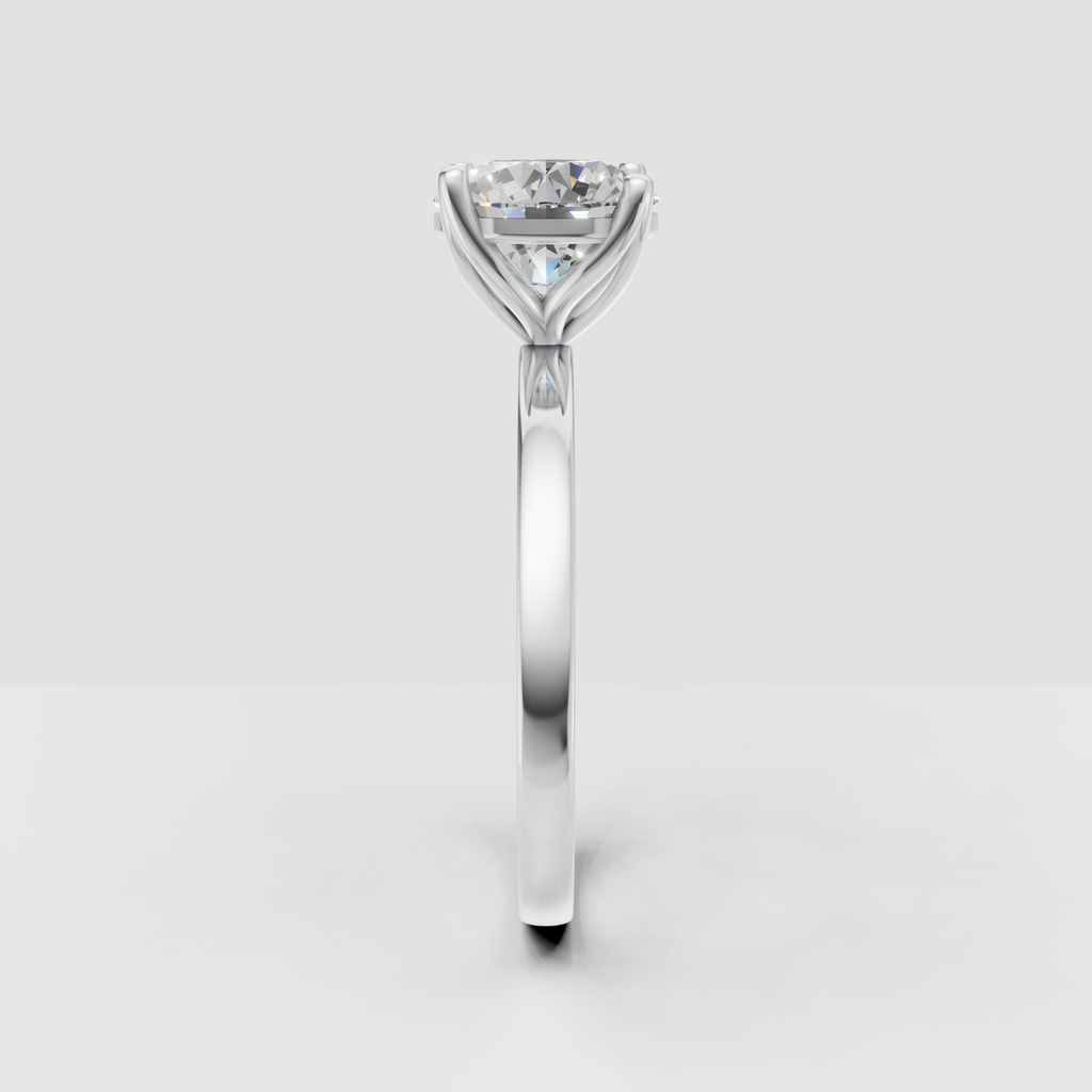 Yellow gold solitaire ring featuring a brilliant round center stone