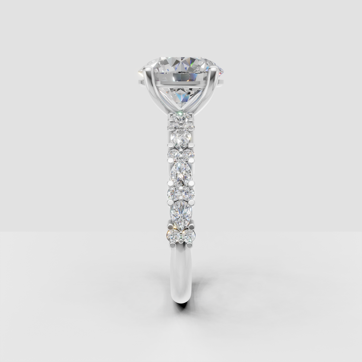 Timeless round diamond engagement ring with detailed accent band