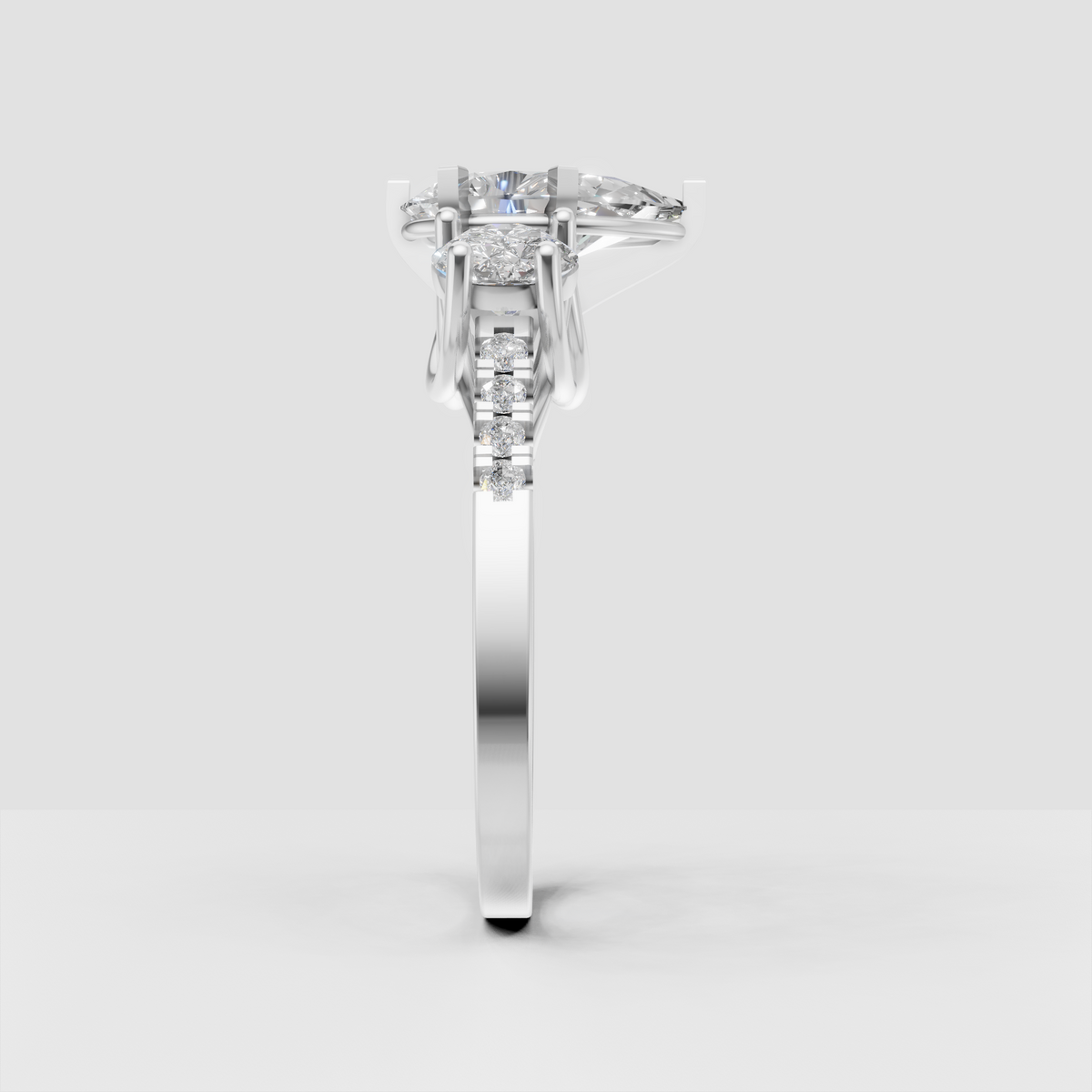 Elegant pear shaped diamond engagement ring with round side stones