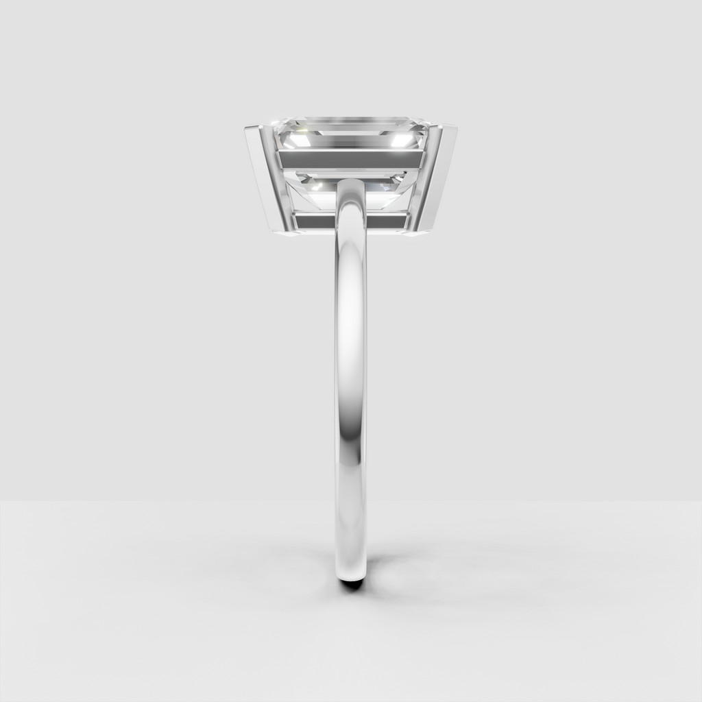 Minimalist emerald cut engagement ring