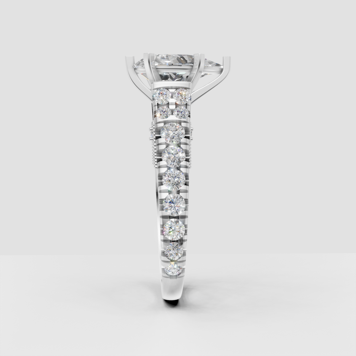 Pear cut diamond ring with refined prong setting