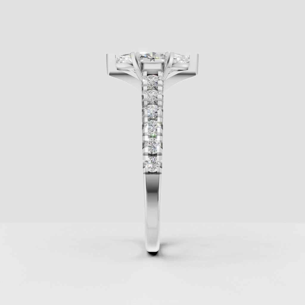 Yellow gold marquise ring with elongated center stone and round diamond accents
