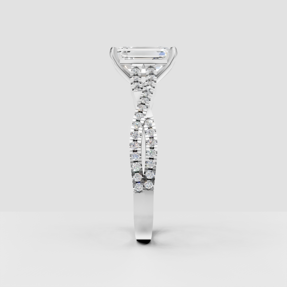 Luxury emerald cut diamond cathedral ring with sparkling shoulders