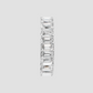 Emerald cut eternity wedding ring with polished yellow gold