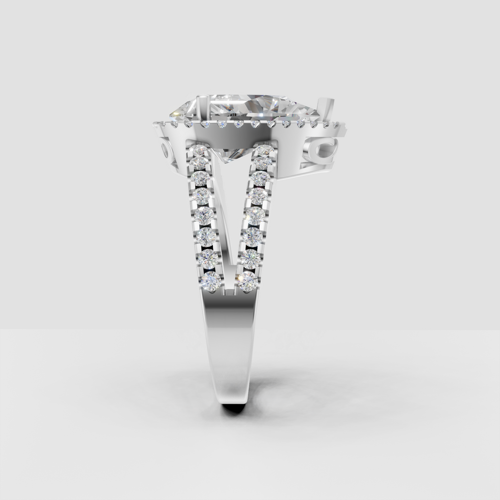 Elegant pear diamond halo ring with polished yellow gold setting