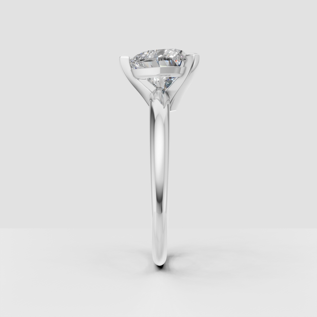 Three prong heart diamond solitaire engagement ring with elevated setting
